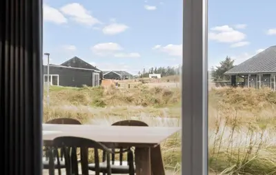 a view of a table and chairs from a window at Amazing Home In Thisted With Wifi in Thisted