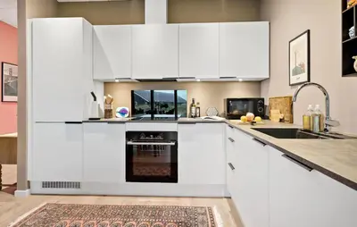 a kitchen with white cabinets and an oven at Amazing Home In Thisted With Wifi in Thisted