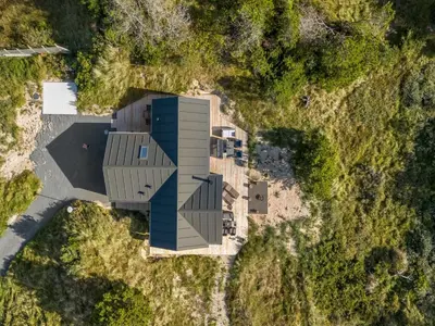 an overhead view of a building in a field at Holiday Home Helga - 900m from the sea by Interhome in Blokhus