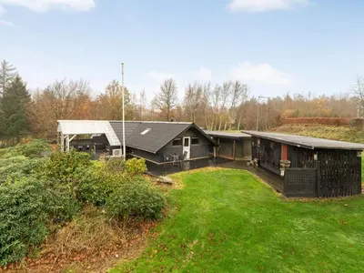 an aerial view of a house with a yard at Holiday Home Jantje - 500m to the fjord by Interhome in Spottrup
