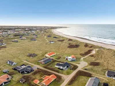 an aerial view of a campground next to the ocean at Holiday Home Amina - 50m from the sea by Interhome in Torsted