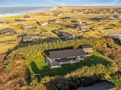 an aerial view of a home next to the beach at Holiday Home Godja - 300m from the sea by Interhome in Torsted