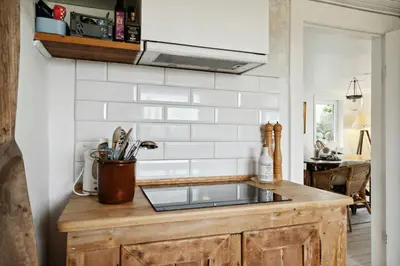 a kitchen with a sink and a counter top at Nature-Close Home Near Beach At Limfjorden in Thyholm
