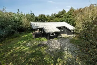 an aerial view of a cabin in the woods at Warm Colors And Beautiful Outdoors In Thy in Sønder Ydby