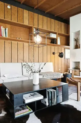 a living room with a coffee table and a couch at Authentic Friis & Moltke House In Lundo's Nature in Højslev
