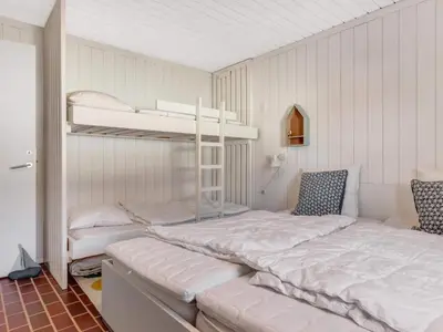 a bedroom with two bunk beds in a room at Charming Retreat in Rodhus - By Traum Ferienwohnungen in Pandrup