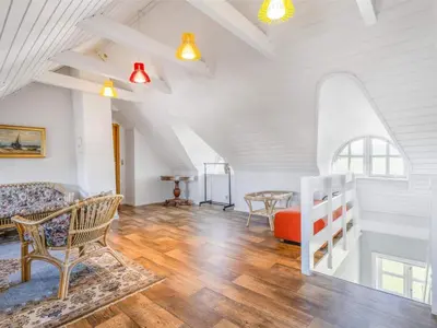 a living room with a couch and a table at Charming Retreat in Blokhus - By Traum Ferienwohnungen in Blokhus