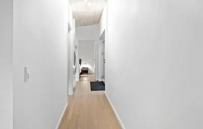 a hallway with white walls and a white ceiling at 2 Bedroom Pet Friendly Home In Vemb in Vemb