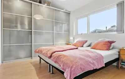 a bedroom with a bed and a window at Gorgeous Home In Nibe With Wifi in Nibe