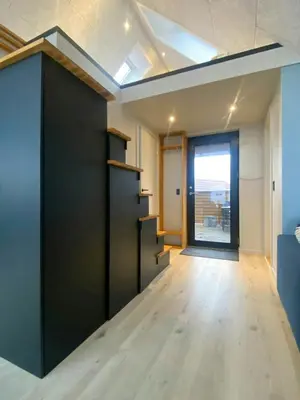 an empty room with a door and a window at Panoramic Views Of Venø Bay At Handbjerg Marina