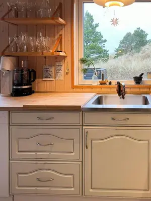 a kitchen with a sink and a window at Creative Family House Near Blokhus Beach in Blokhus
