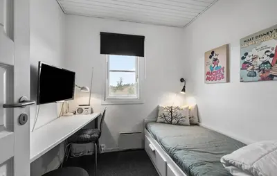 a bedroom with a desk and a bed and a desk sidx sidx sidx at Gorgeous Apartment In Vestervig in Vestervig