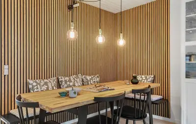 a dining room with a wooden table and chairs at Gorgeous Apartment In Vestervig in Vestervig