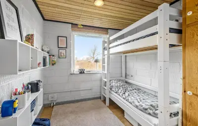 a room with two bunk beds and a window at Gorgeous Home In Vinderup With Wifi in Vinderup