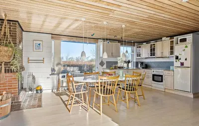 a kitchen with a table and chairs in it at Gorgeous Home In Vinderup With Wifi in Vinderup
