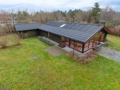 an overhead view of a home with a solar roof at Charming Wooden Summer House In Trend in Løgstør