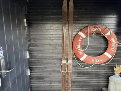 a life preserver is hanging on a garage door at Holiday Home Alrike - 200m from the sea by Interhome in Brovst