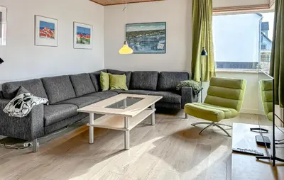 a living room with a couch and a table at Gorgeous Home In Thisted With Wifi in Thisted