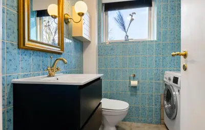 a bathroom with a sink and a toilet at 3 Bedroom Cozy Home In Farsø in Farsø