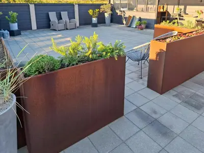 a patio with a bunch of plants at Charming Town House In Thyborøn Near The North Sea in Thyborøn