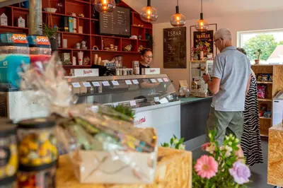 two people standing at a counter in a store at Holstebro Søpark in Holstebro