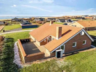 an aerial view of a house with a roof at Holiday Home Nikolce - 300m to the fjord by Interhome in Vinderup