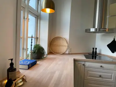 a kitchen with a sink and a counter top at Modern Scandinavian Apartment in Viborg Centre in Viborg