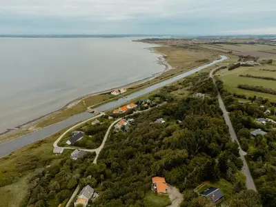 an aerial view of the shore of a lake at Warm 70S Vibe Near Limfjord in Løgstør