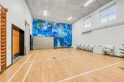 an empty room with a painting on the wall at Exclusive Pool Houseconference Center With Gymnasium in Erslev