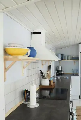 a kitchen with a counter with a yellow bowl at Traditional Holiday Home At Cold Hawaii in Torsted