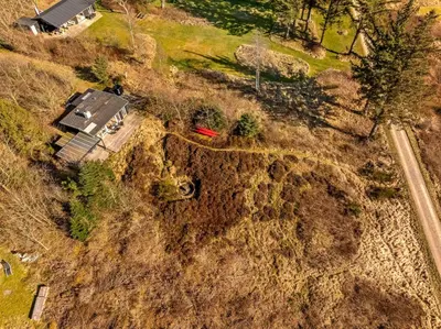 an aerial view of a house with a red frisbee at Lovely Holiday Home With Panoramic View Of The Fjord in Amtoft