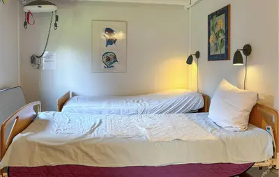a room with two beds in a room at Stunning Home In Farsø With Wifi in Farsø