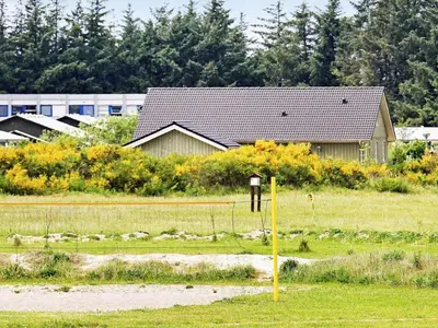 a house in the middle of a field at 4 star holiday home in Brovst in Brovst