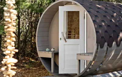a circular shed with a door in a mirror at Stunning Home In Hurup Thy With Sauna in Sønder Ydby
