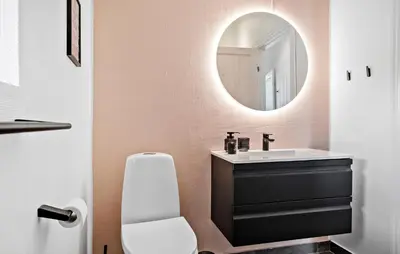 a bathroom with a sink and a mirror at Stunning Home In Hurup Thy With Sauna in Sønder Ydby