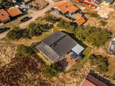 an overhead view of a house with a solar roof at Holiday Home Mynthe - 500m from the sea by Interhome in Thisted