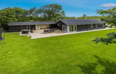 a house with a large yard with a yard at 3 Bedroom Stunning Home In Spøttrup in Spottrup