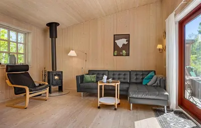 a living room with a couch and a fireplace at Beautiful Home In Fur With Wifi in Fur