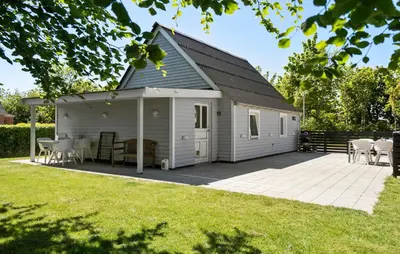 a large white building with a pitched roof at Stunning Home In Vemb With Wifi in Vemb