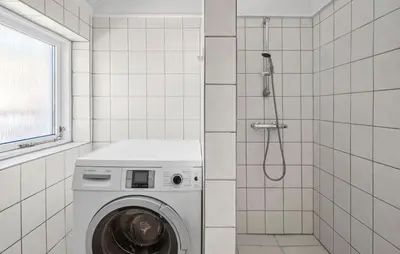 a washing machine in a bathroom with a shower at Stunning Home In Vemb With Wifi in Vemb