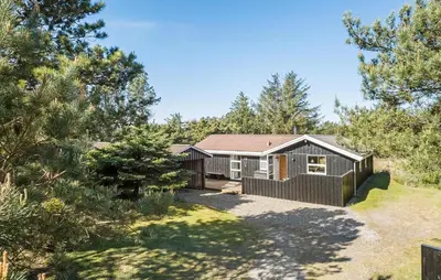 a house in the middle of a garden at Stunning Home In Saltum With Wifi in Saltum