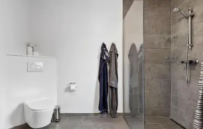a bathroom with a shower and a toilet at 3 Bedroom Cozy Home In Højslev in Højslev