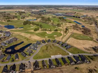 an aerial view of a golf course with houses at Apartment Kauno - 16km to the fjord by Interhome in Farsø