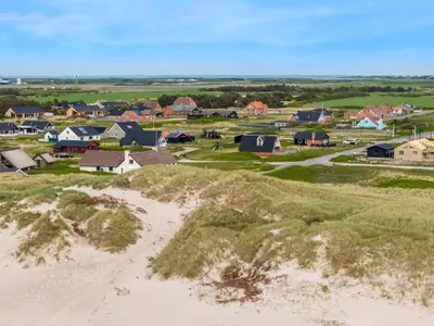 an aerial view of a small town with a beach at Holiday Home Arkil - 200m from the sea by Interhome in Harboør