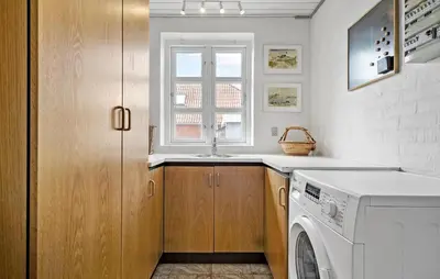 a kitchen with a washing machine and a window at Gorgeous Home In Vestervig With Wifi in Vestervig