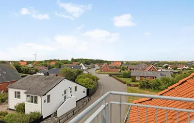a view from a balcony of a small town with houses at 3 Bedroom Amazing Home In Harboøre in Harboør