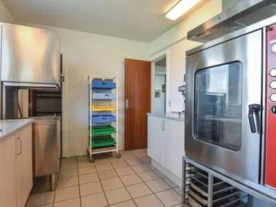 a kitchen with a large oven in a kitchen at 4 star holiday home in Thyborøn in Thyborøn