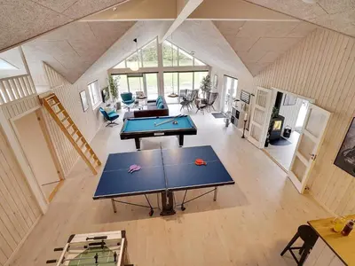 a room with two ping pong tables in it at 5 star holiday home in Spøttrup in Spottrup