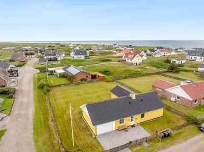 an aerial view of a small village with houses at Lovely Holiday Home With Fenced Plot, 300 Meters From The North Sea In Thy in Lild Strand
