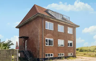 a brick building with a roof on top of it at Amazing Home In Harboøre With Wifi in Harboør